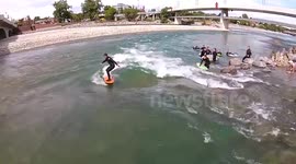 Drone films surfers on Canadian river