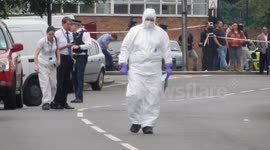 Police stand guard at scene of beheading in Edmonton, London