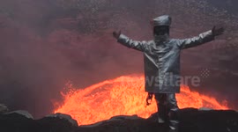 Man walks into crater of active volcano