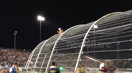 Drunk Fan (NASCAR) Climbs Fence @ Richmond International Raceway