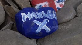 Pro Union supporters place stones at Scottish cairn