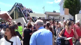 Racegoers enter Royal Ascot from a bridge across Ascot High Street - Ladies Day 2018