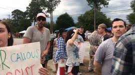 RUSHES: Protestors stage anti-Trump demonstration outside Republican rally in Columbia, South Carolina
