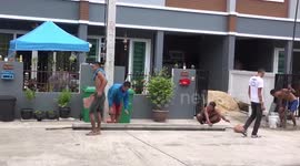 Thai builders work together to get the job done