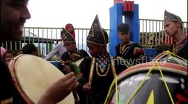 Indonesia's cowhide drum troupe entertain tourists