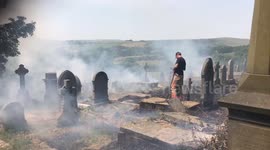 Graveyard fire tackled by firefighters