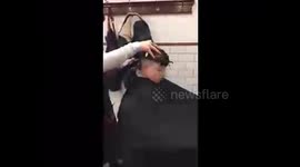 6 year old boy sleeps through haircut at barbers