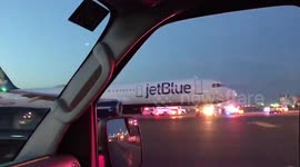 SWAT team storms JetBlue plane at JFK airport after pilot accidentally reports hijacking