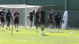 Dele Alli shadow boxes Harry Kane during England training