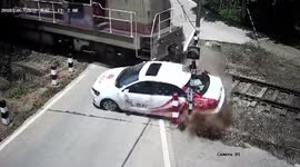 Train collides with car on rail tracks