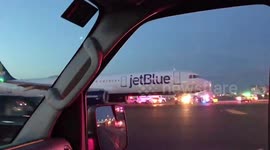 SWAT team storms JetBlue plane at JFK airport after pilot accidentally reports hijacking