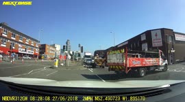 ORIGINAL: Motorcyclist ends up in truck's bed after side-on collision