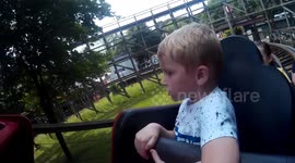 Kid riding roller-coaster and experiences every emotion!