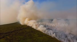 Dramatic aerial views of large gorse fire still raging in Northern Ireland