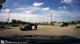 Thief makes getaway while holding stolen mini fridge outside car window with hair blowing in the wind.