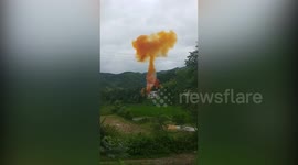 Debris from rocket lands on town in China, causing massive explosion