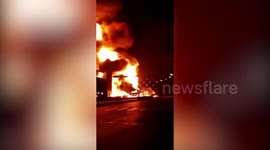 Huge blaze rips through residential building after eastern China oil tanker crash