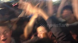 Sea of Japanese fans celebrate team progress