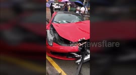 Out-of-control Ferrari collides with BMW
