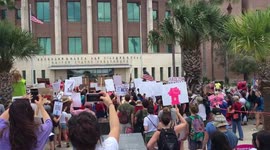 Protesters stage immigration rally outside federal courthouse in Texas border town