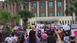 Protesters stage immigration rally outside federal courthouse in Texas border town