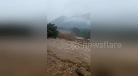 Flash floods sweep through Vietnamese village