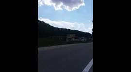 Old junkyard in Bosnia burns down car