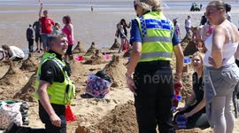 Police lend a hand to try to break sandcastles record in Cleethorpes