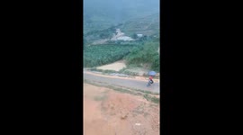 The flash floods swept away 25 houses in a village