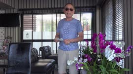 Japanese man sings the Thai National Anthem.
