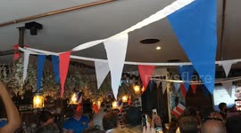 French football fans sing national anthem in unison