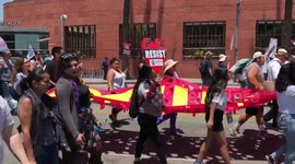 Protesters chant ‘Stand up, fight back’ at Families Belong Together rally