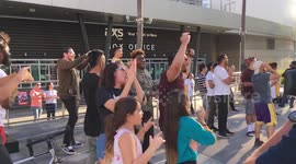 Fans celebrate LeBron James' Lakers signing outside Staples Centre