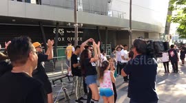 Fans celebrate LeBron James' Lakers signing outside Staples Centre