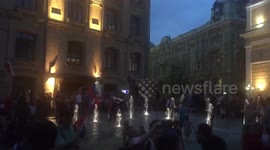Overjoyed Russian fans jump into fountain after win over Spain