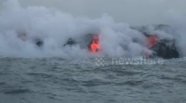 Kilauea molten lava falls into ocean forming new land