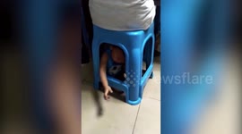 Video of mum trapping one-year-old son under stool to play mahjong causes outrage in China
