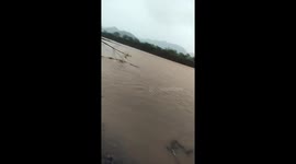 Hero teachers cross flooded river to reach morning classes on time