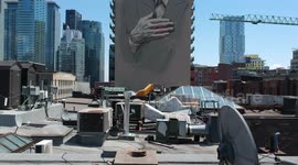 Iconic Leonard Cohen mural on downtown Montreal sky-scraper
