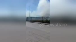 Now grass in a field has caught fire in Birkenhead 'because of the heatwave'