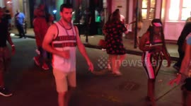 Man picks Beads from Horse Dung - Bourbon Street NOLA - Legend Status