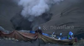On Indonesia's Mount Bromo, tribes throw religious offerings into an active volcano