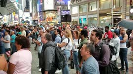 Sports Fans Watch World Cup Through a Resto window in NYC