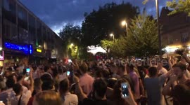 Fans celebrate in Watford after England beats Colombia 4-3 in dramatic penalty shootout
