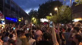 Fans celebrate in Watford after England beats Colombia 4-3 in dramatic penalty shootout