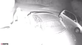Crook caught on CCTV ignoring an Audi on a driveway - and stealing two WHEELIE BINS