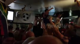 England Fans dancing on tables and singing Don't Take Me Home after England penalty win