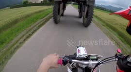Motorbiker captures heart-stopping moment he ducks under truck