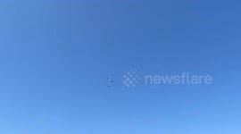 Acrobatics at IBAS Airshow in Copacabana Beach, Rio de Janeiro.