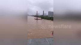 Piledriver washed away by floods crashes into bridge